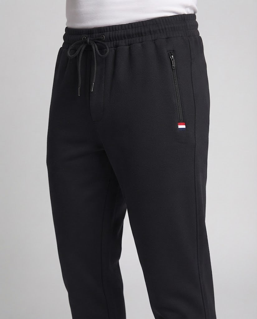 Men's sporty jogger pants with zip pocket, elastic waistband, and ribbed hem Chichicherry