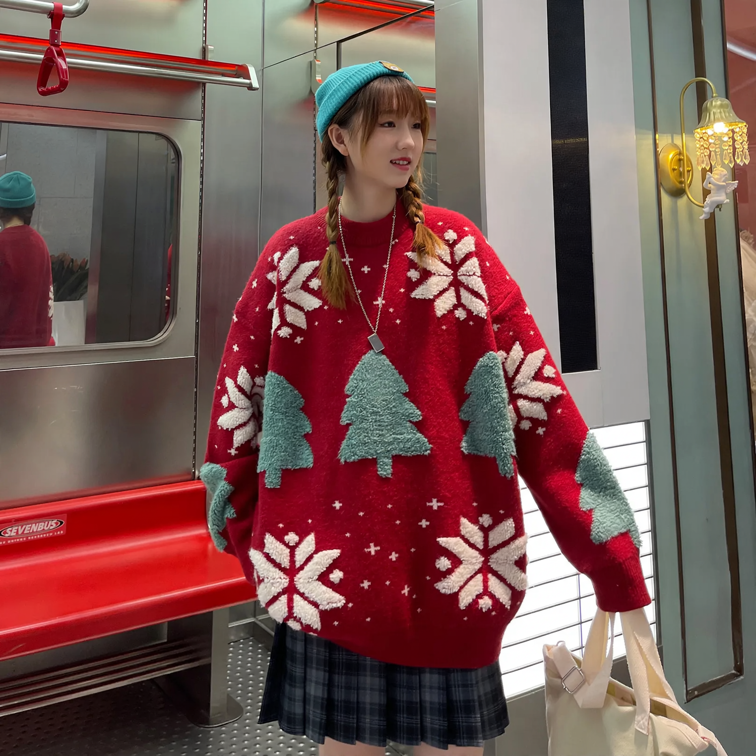 Loose Christmas knit sweater with reindeer motif