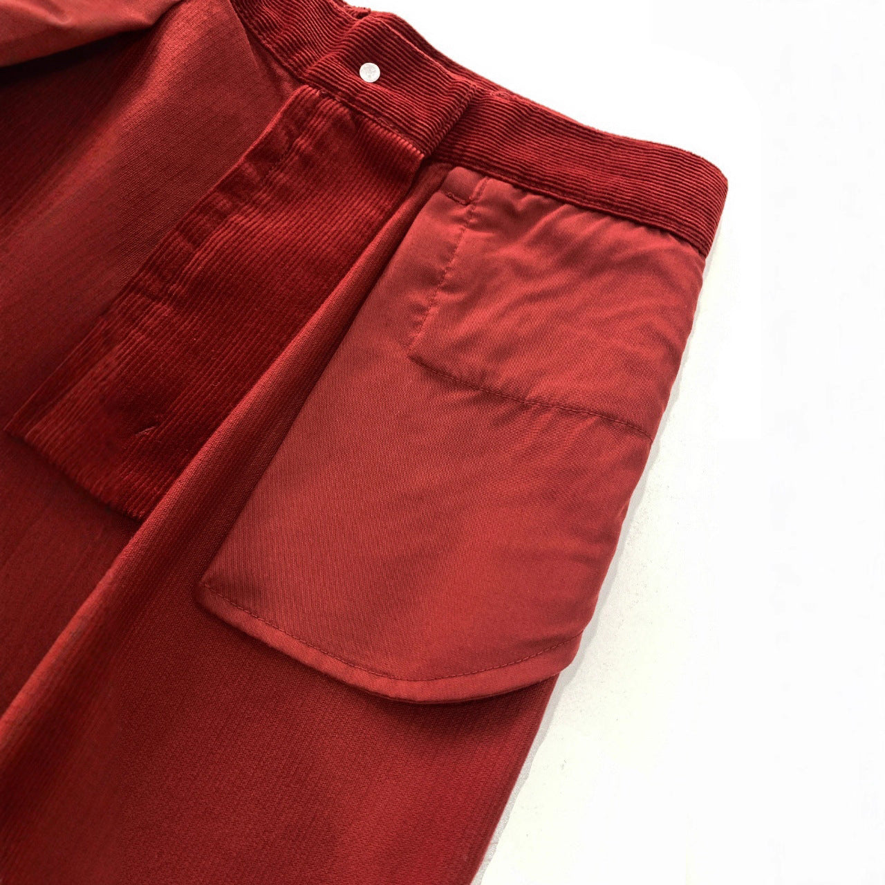 Red corduroy pants with wide leg and high waist