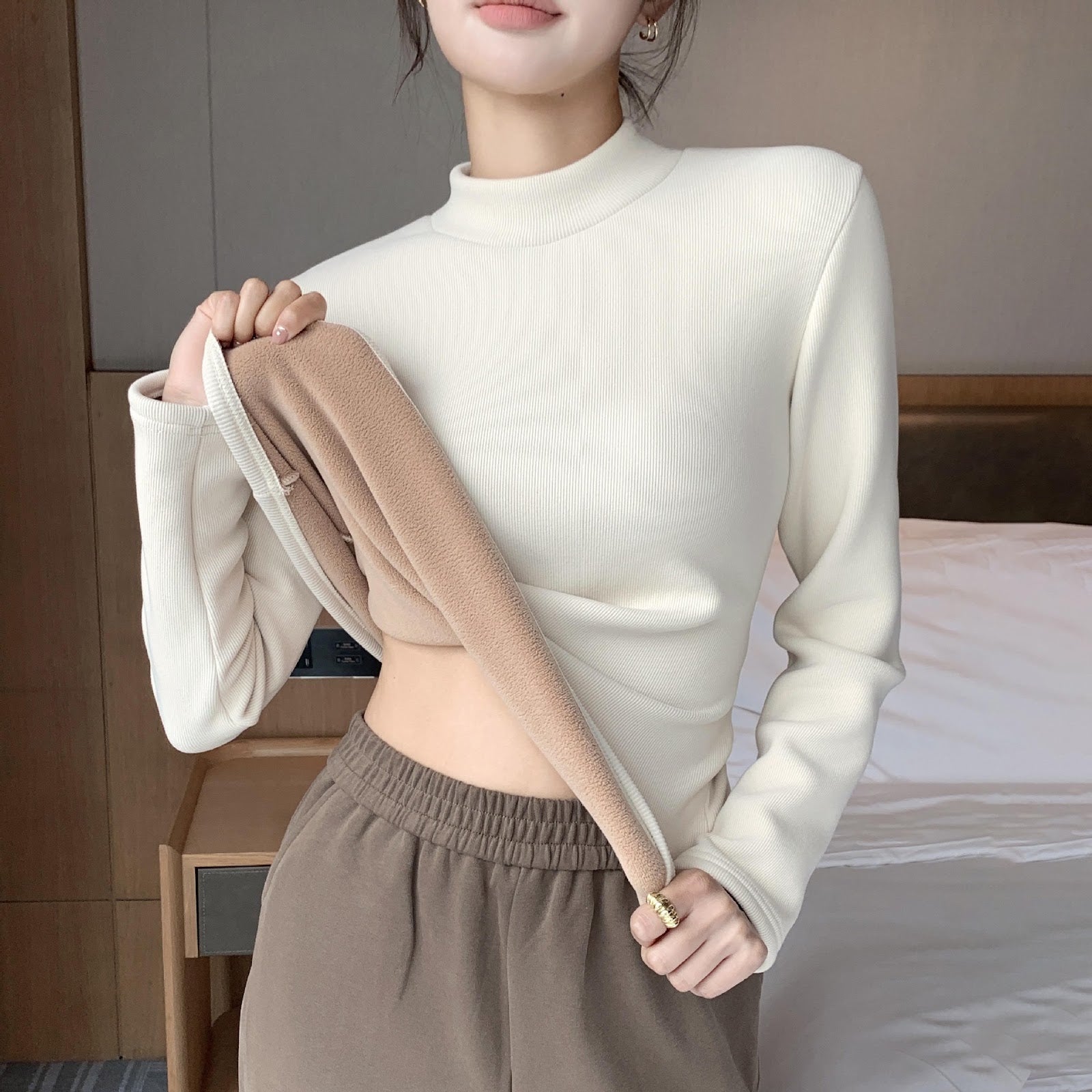 Women's knit shirt with stand-up collar, lined