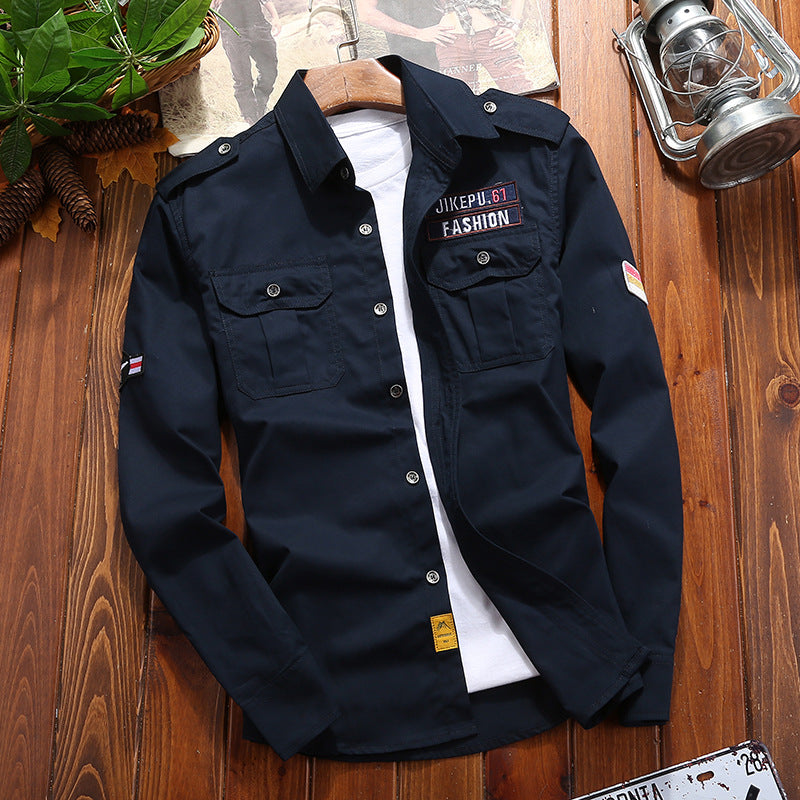 Men's utility shirt jacket with shoulder flaps, patch chest pockets, and patch applications Chichicherry