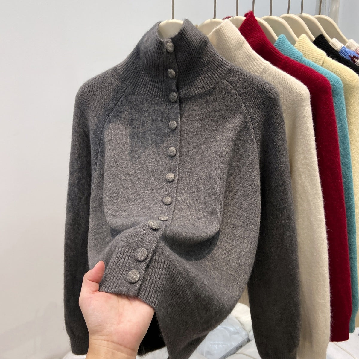Ladies' cardigan with standing collar and button placket