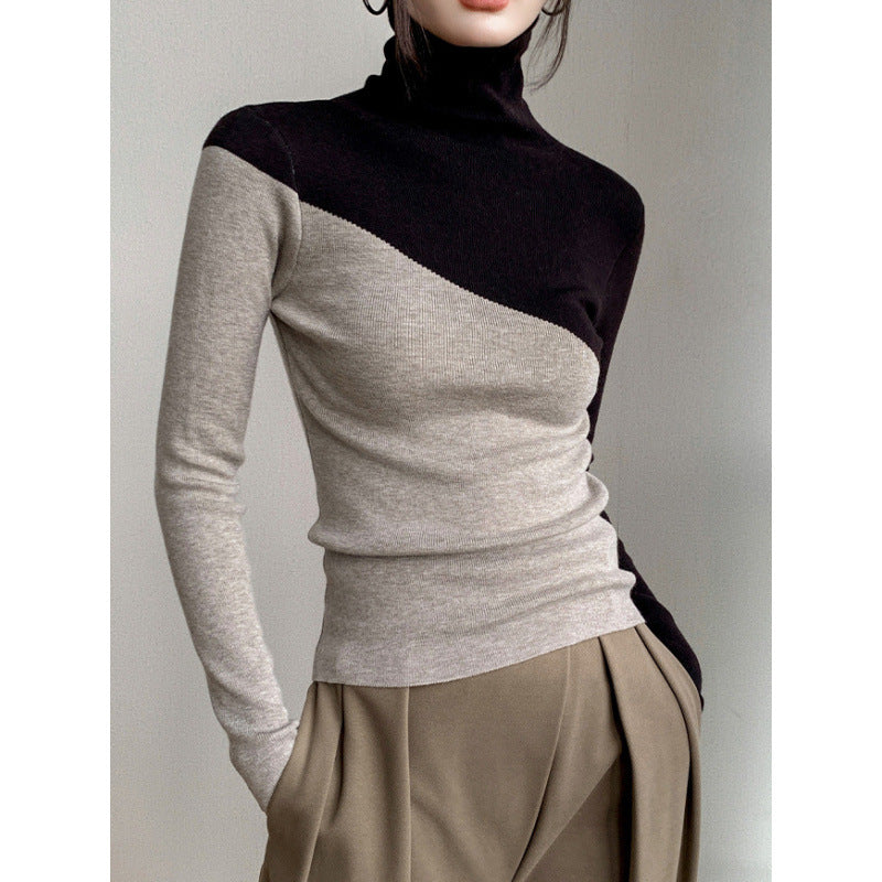 Narrow knit sweater with stand-up collar and color accents