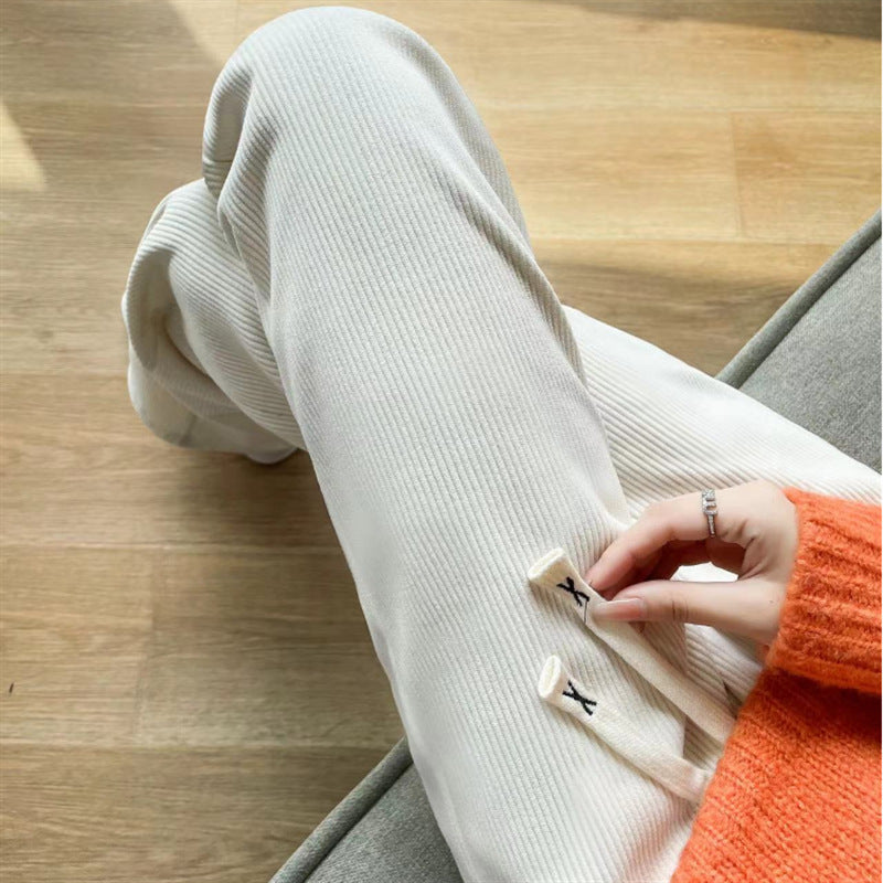 Women’s corduroy pants with a high waistband, straight-cut