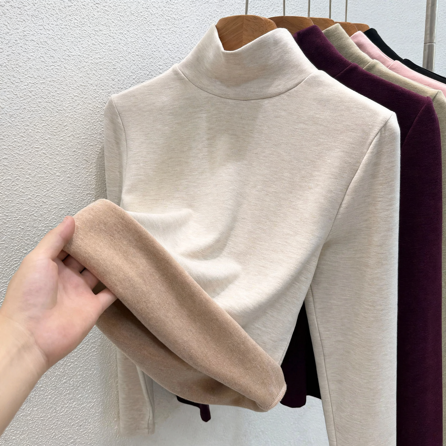 Women's turtleneck sweater made of wool blend fabric