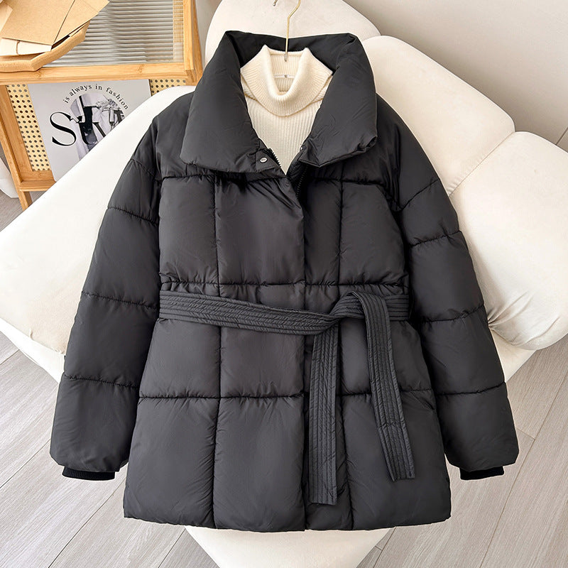 Mid-length women's winter jacket with waist belt