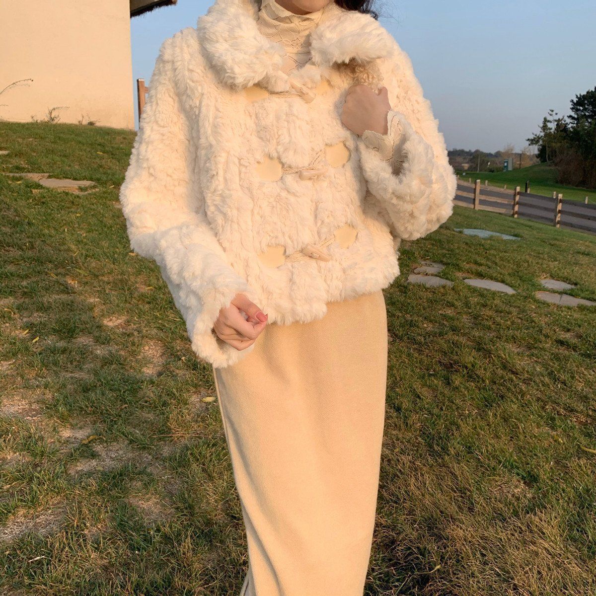 Faux fur jacket with toggle buttons