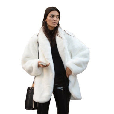 Elegant women's faux fur coat, fluffy