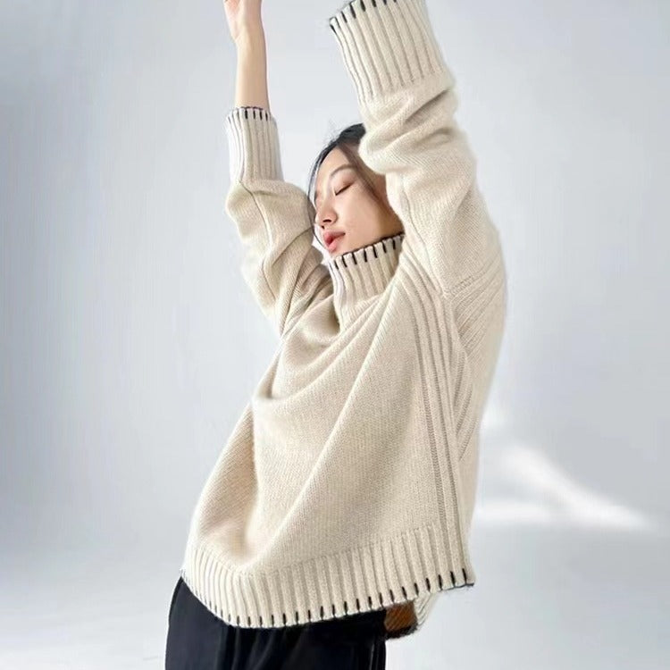 Women's knit sweater with cable pattern and turtleneck