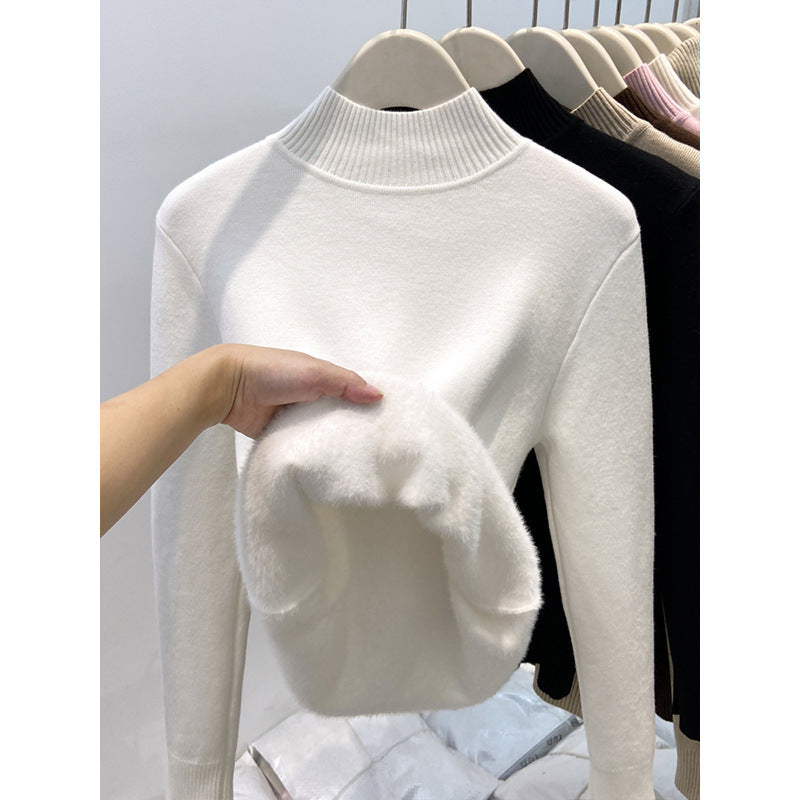 Padded women's knit sweater with high collar