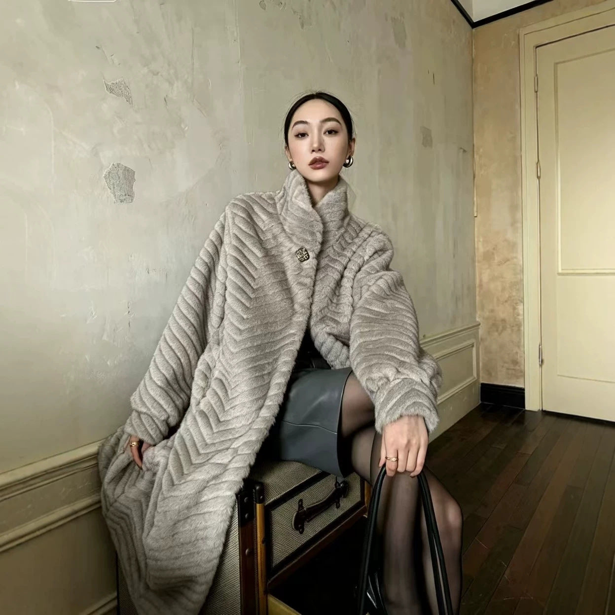 Women's coat in fur look with herringbone pattern