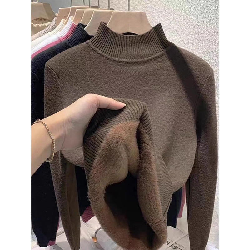 Padded women's knit sweater with high collar