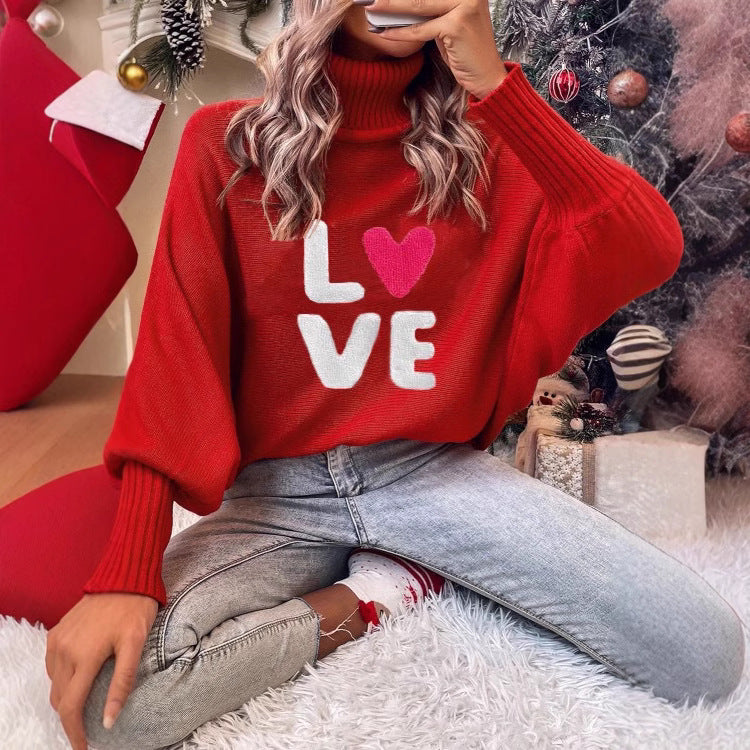 Women's knitted pullover with stand-up collar and embroidery