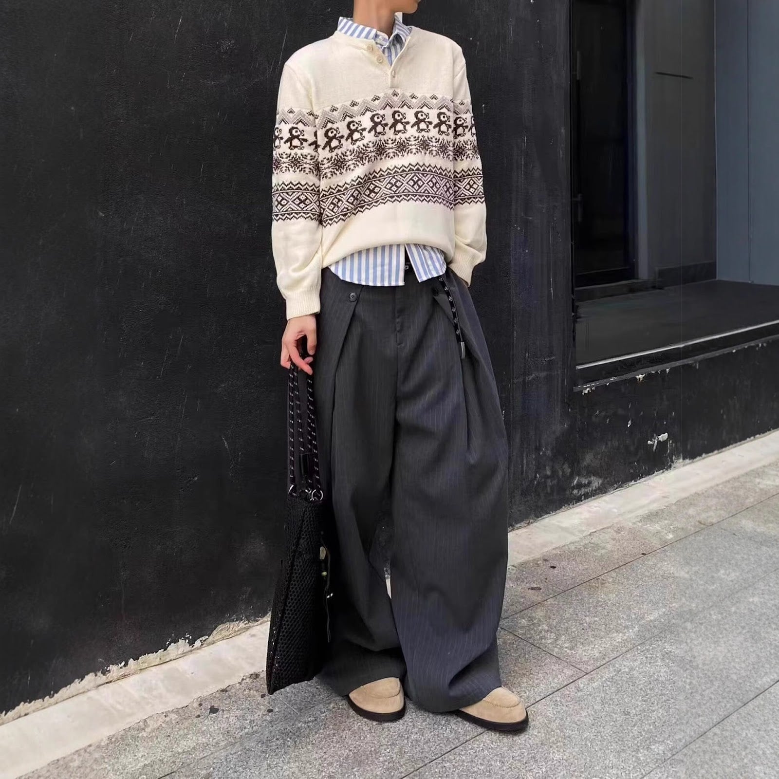 Unisex knitted sweater with fair isle pattern and button placket