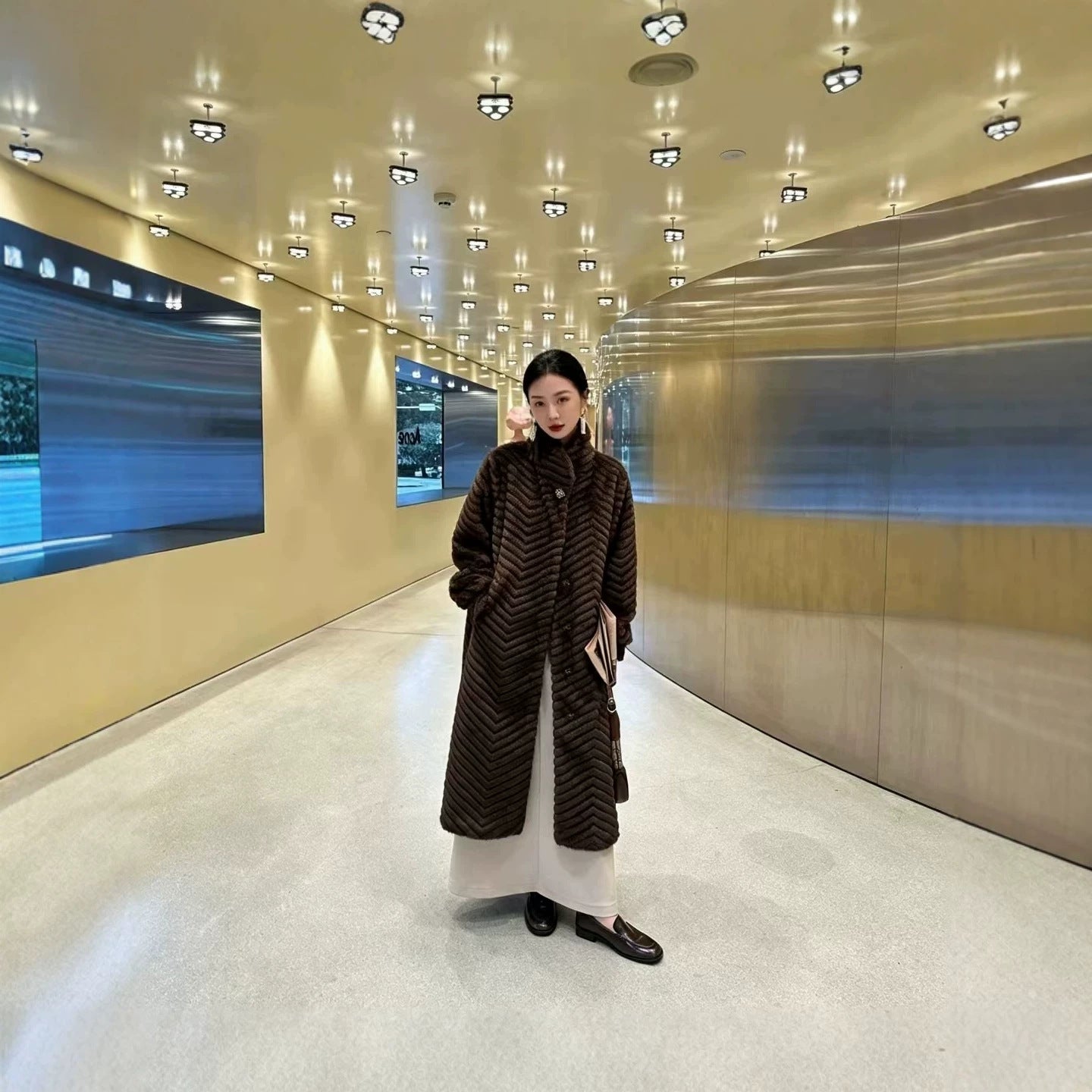 Women's coat in fur look with herringbone pattern