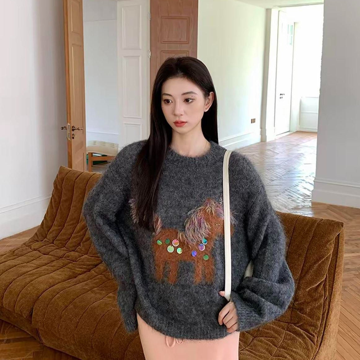 Women's knitted sweater with horse embroidery