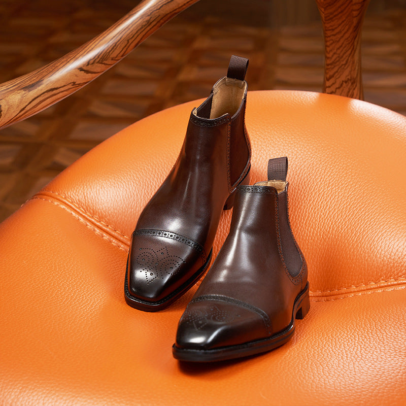 Men's Chelsea boots made of leather, brogue design, round