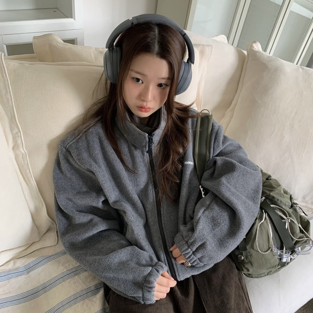 Fleece jacket with stand-up collar, zipper and embroidery