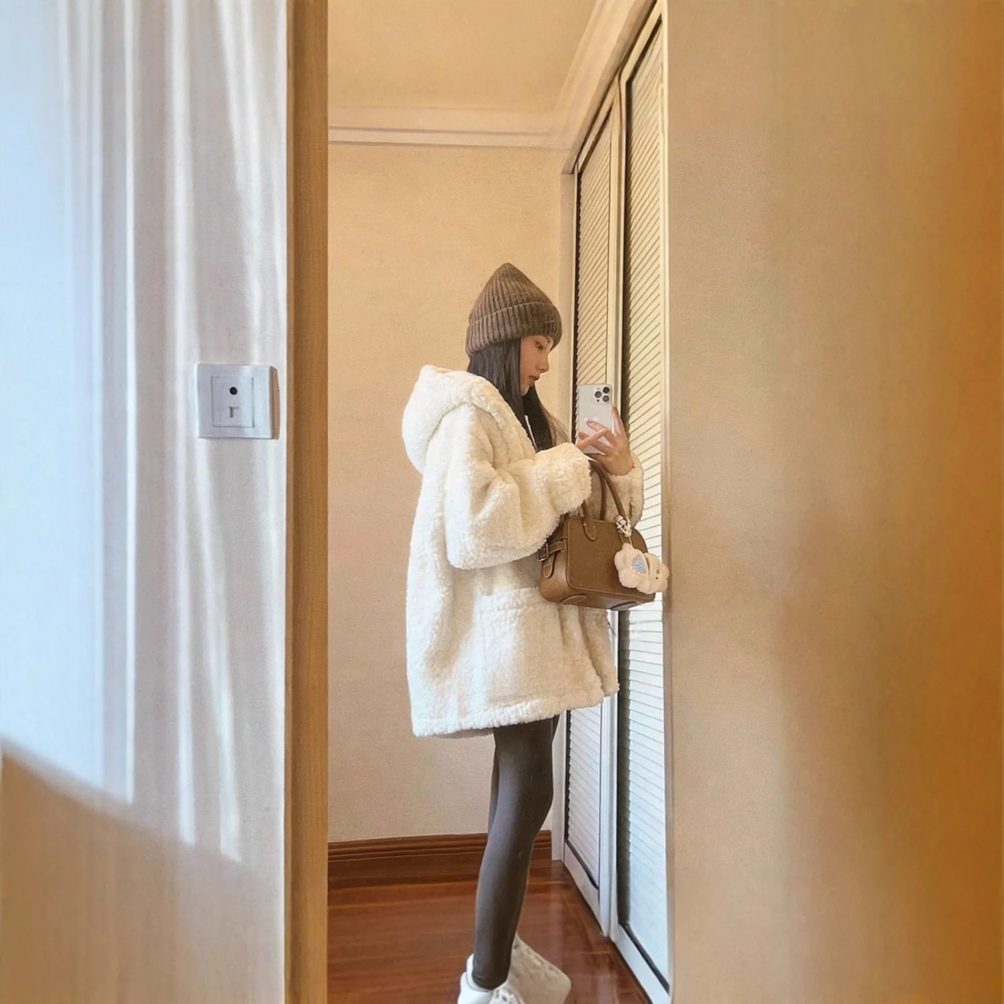 Mid-length lamb fleece coat with hood, lined