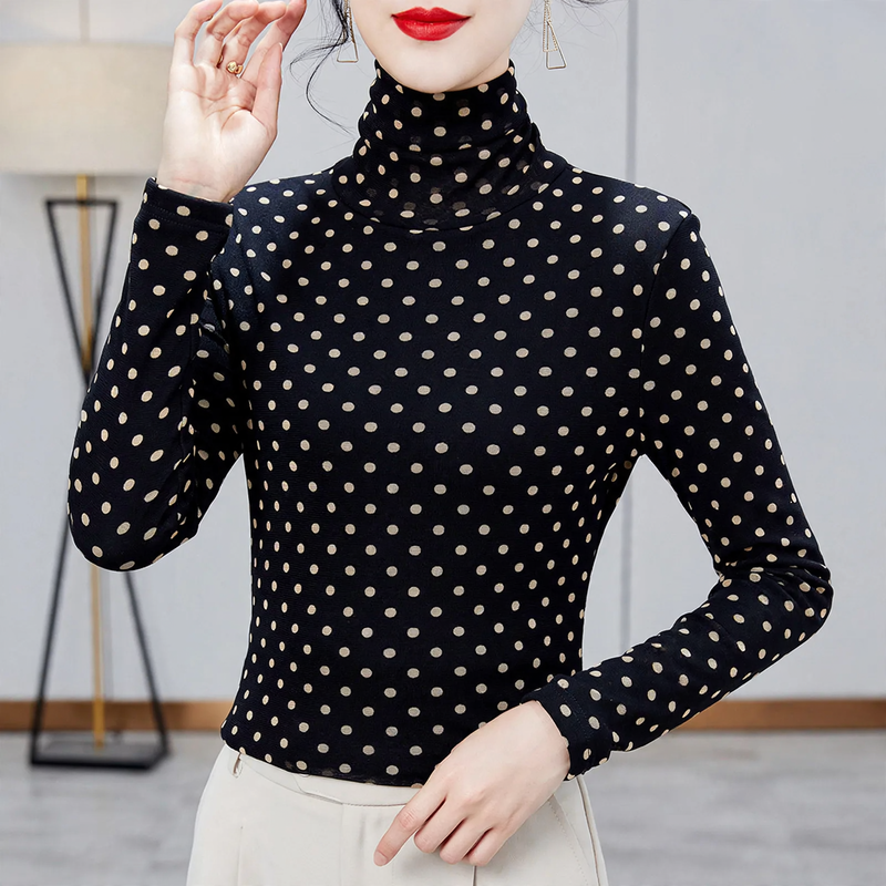 Women's top with stand collar and polka dot pattern