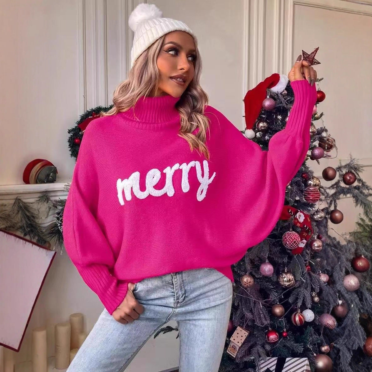Women's knitted pullover with stand-up collar and embroidery