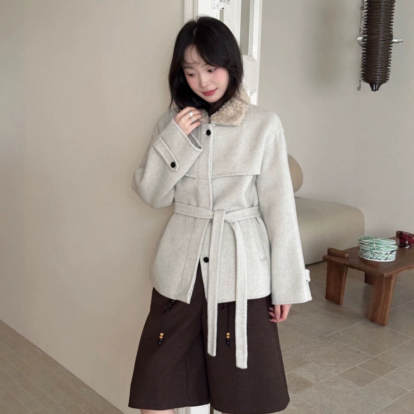 Women's coat with faux sheepskin details, lined