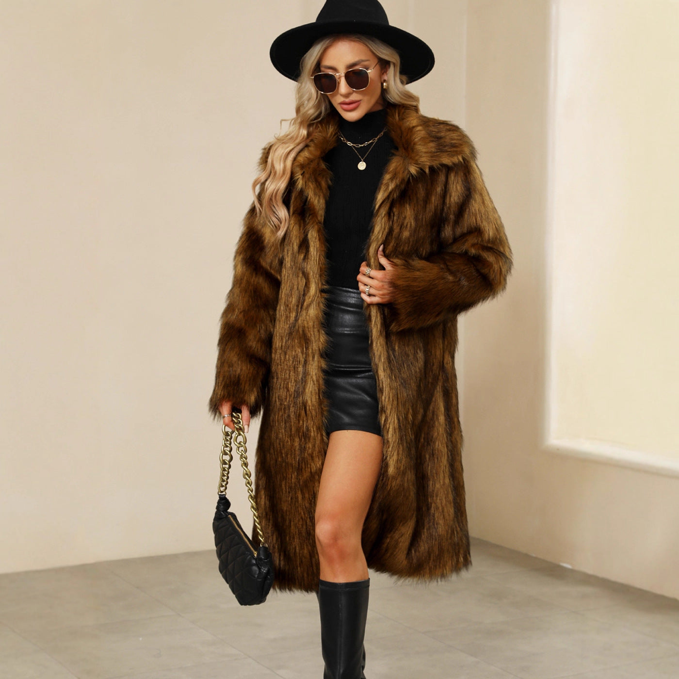 Long women's faux fur coat with square collar and raccoon fur