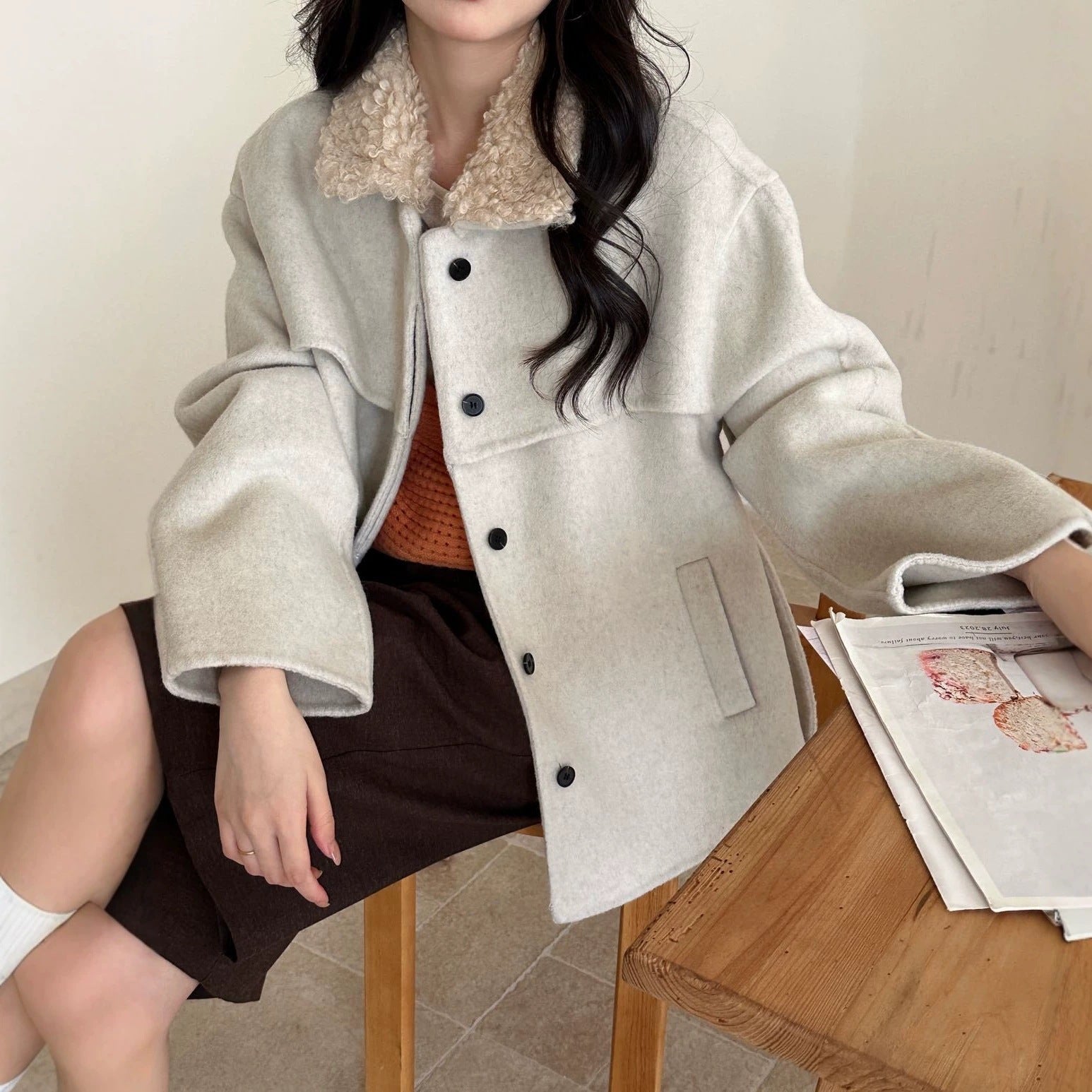 Women's coat with faux sheepskin details, lined