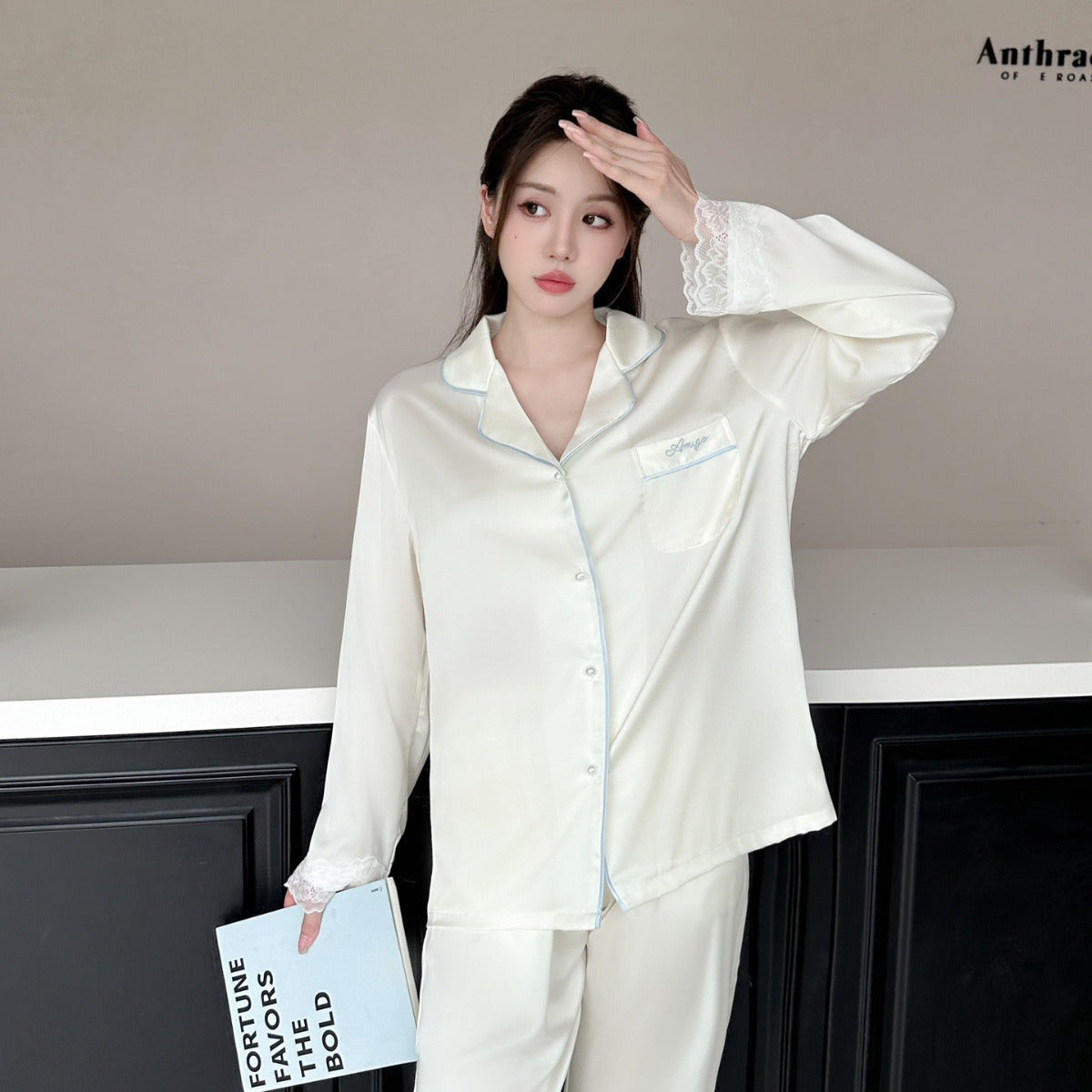 Ladies' sleepwear made of ice silk with lace trim