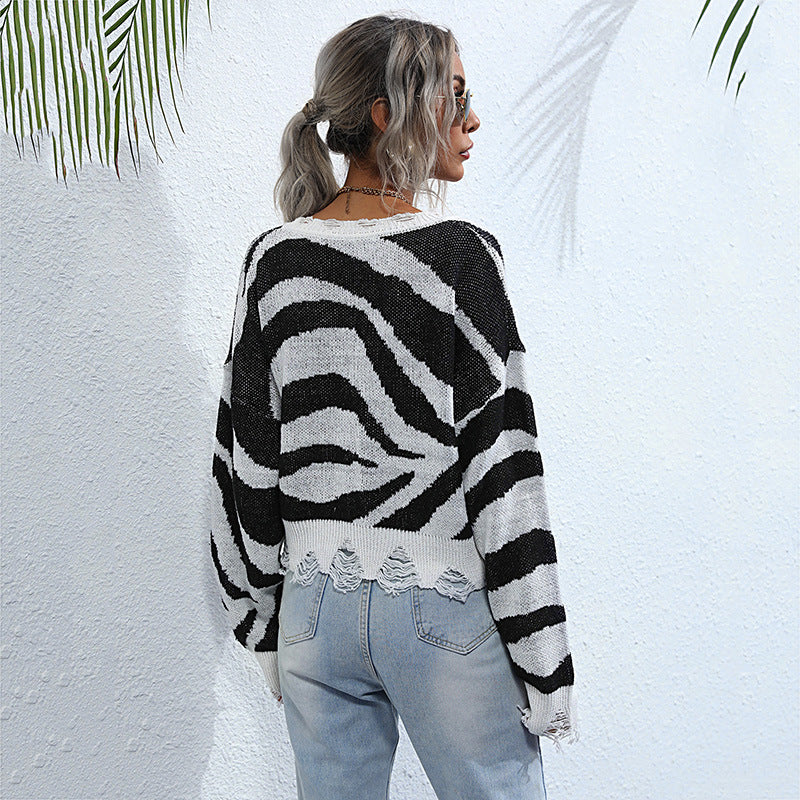 Women's Oversized V-Neck Sweater with Zebra Pattern and Frayed Hem