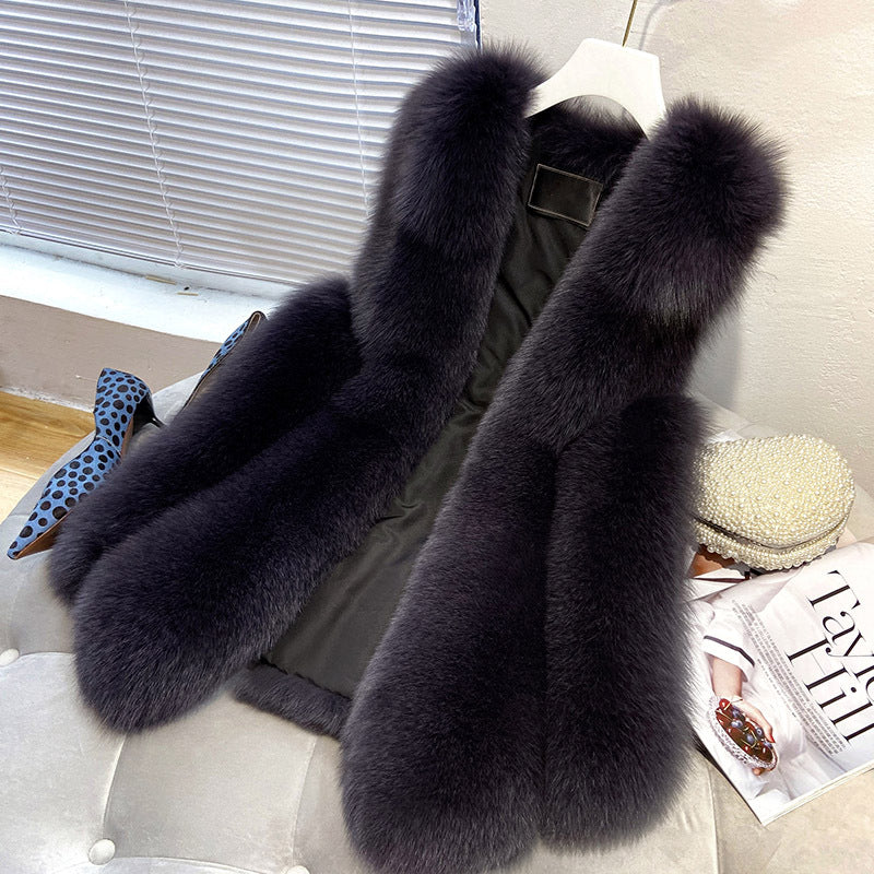 Ladies faux fur vest with long pile fur, waist-length A-line and padded inner finish Chichicherry