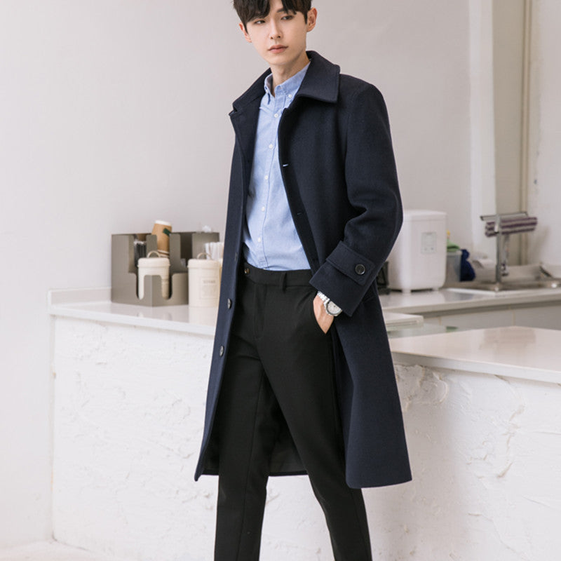 Men's long coat made of wool blend with concealed button placket, waist belt, and classic lapel Chichicherry
