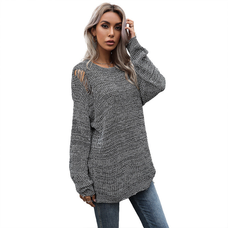 Ladies chunky knit oversized sweater with open stitches, raw hem and round neckline Chichicherry