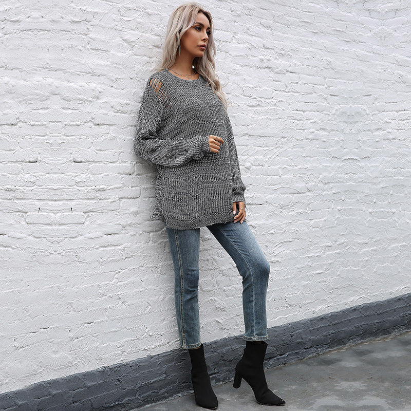 Ladies chunky knit oversized sweater with open stitches, raw hem and round neckline Chichicherry
