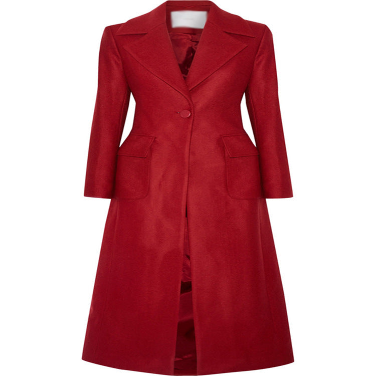 Women's maxi-length wool blend coat with tailored seam design, knife pleats, and flap pockets Chichicherry