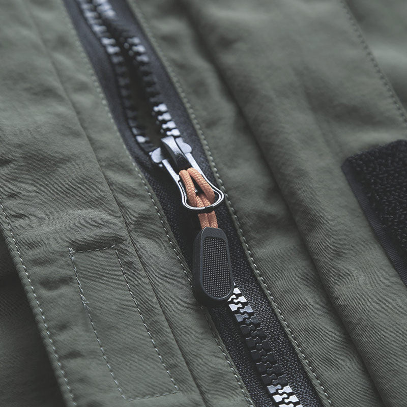 Men's lightweight hooded utility jacket with wind protection and multiple pockets Chichicherry