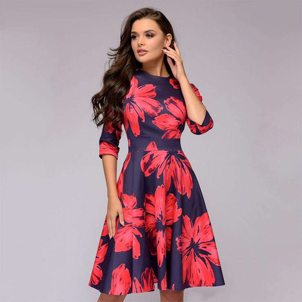 Women's A-line midi dress with 3/4 sleeves, fitted silhouette, and floral print Chichicherry