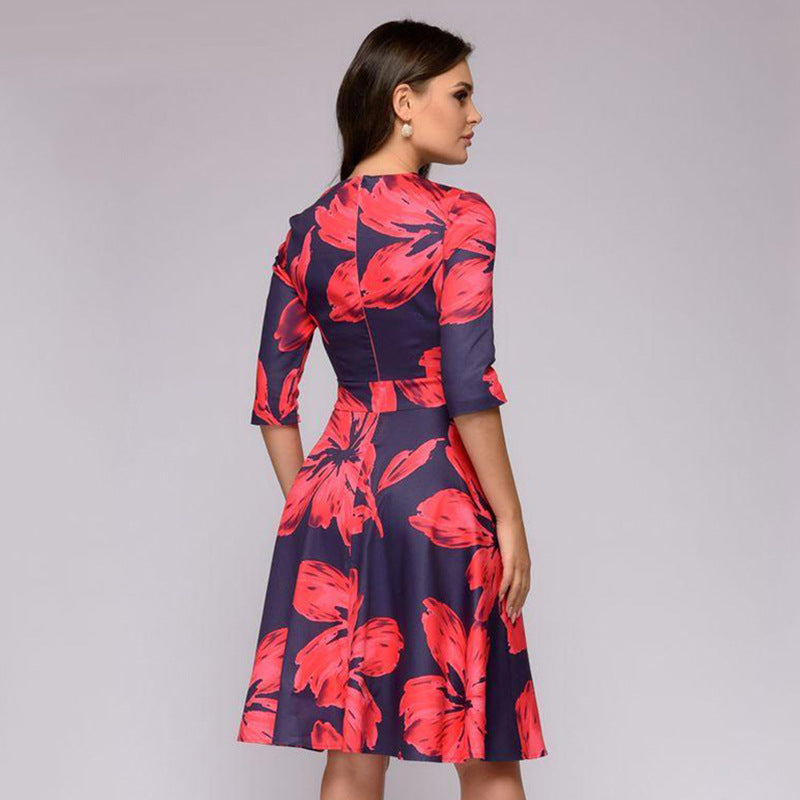 Women's A-line midi dress with 3/4 sleeves, fitted silhouette, and floral print Chichicherry
