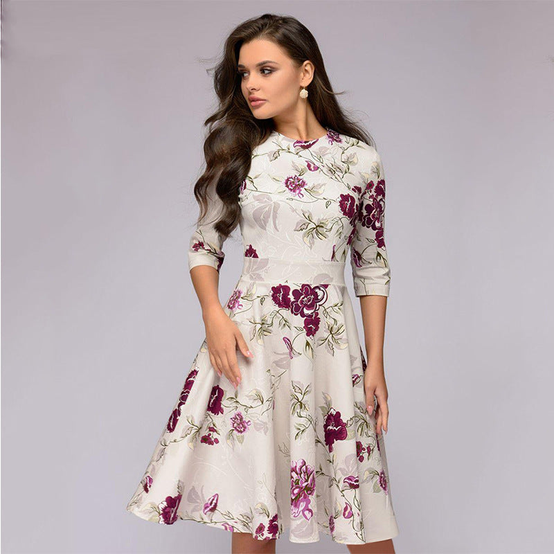 Women's A-line midi dress with 3/4 sleeves, fitted silhouette, and floral print Chichicherry
