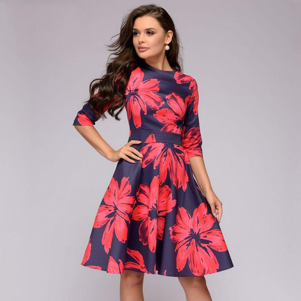 Women's A-line midi dress with 3/4 sleeves, fitted silhouette, and floral print Chichicherry