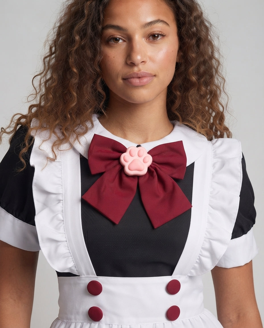 Women's playful maid dress with ruffle details and stylish bow accent Chichicherry