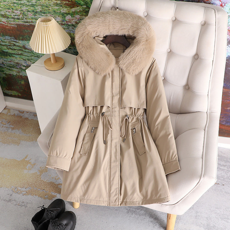 Women's mid-length water-repellent parka with voluminous faux fur collar, waistband drawstring, and multifunctional flap pockets Chichicherry