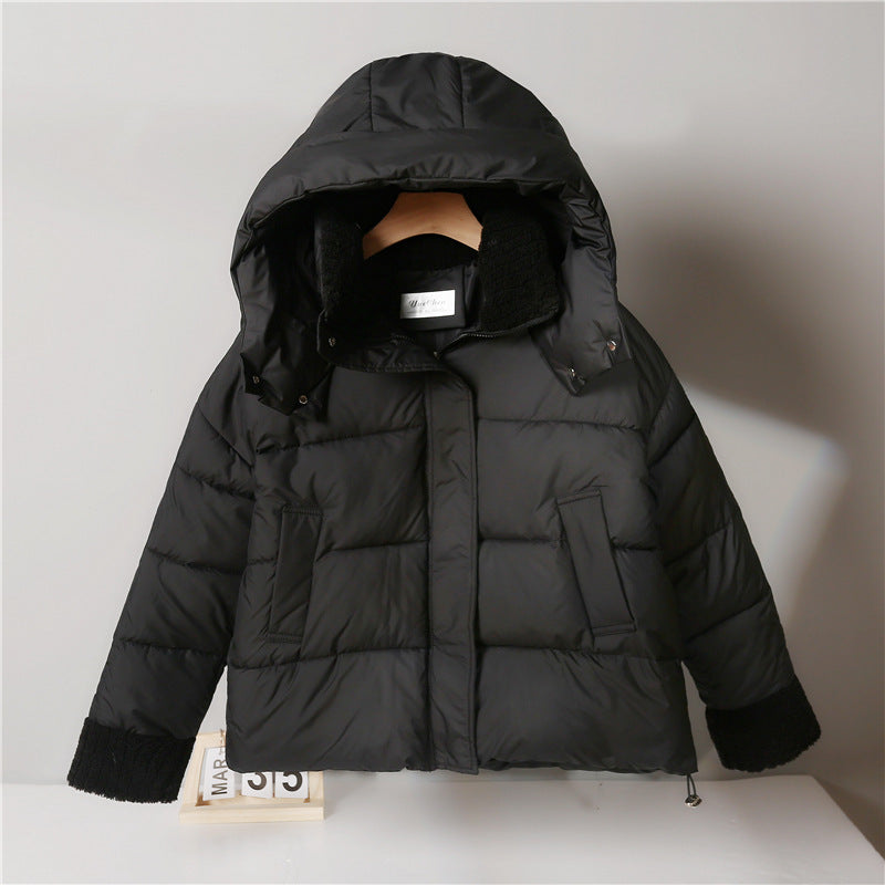 Women's cropped padded jacket with high closing teddy collar, fleece lining and adjustable hem Chichicherry