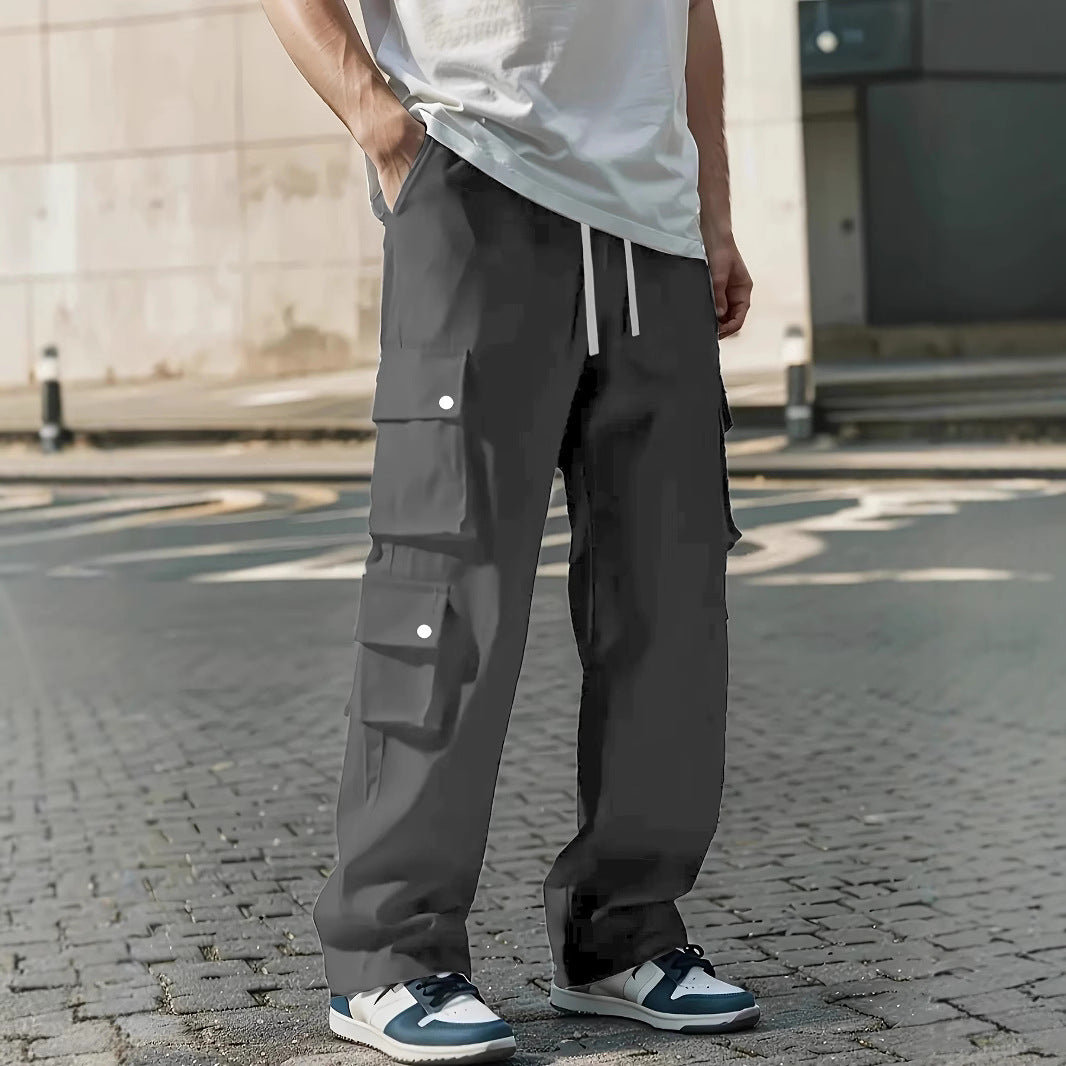 Men's Loose Fit Cargo Pants with Multiple Flap and Utility Pockets & Drawstring Waist Chichicherry