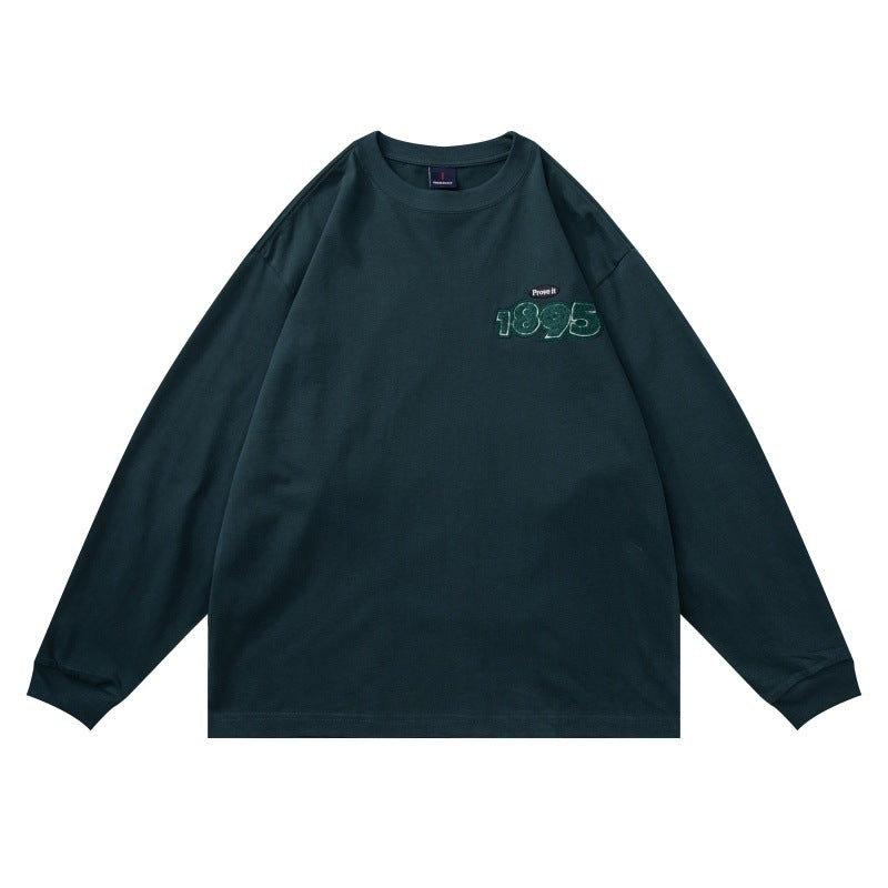 Unisex Oversize-Longsleeve shirt made of cotton blend with ribbed round neck and subtle chest application Chichicherry