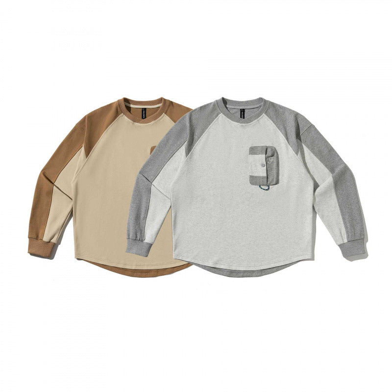 Unisex Oversize Sweatshirt with raglan sleeves, two-tone inserts and utility chest pocket Chichicherry