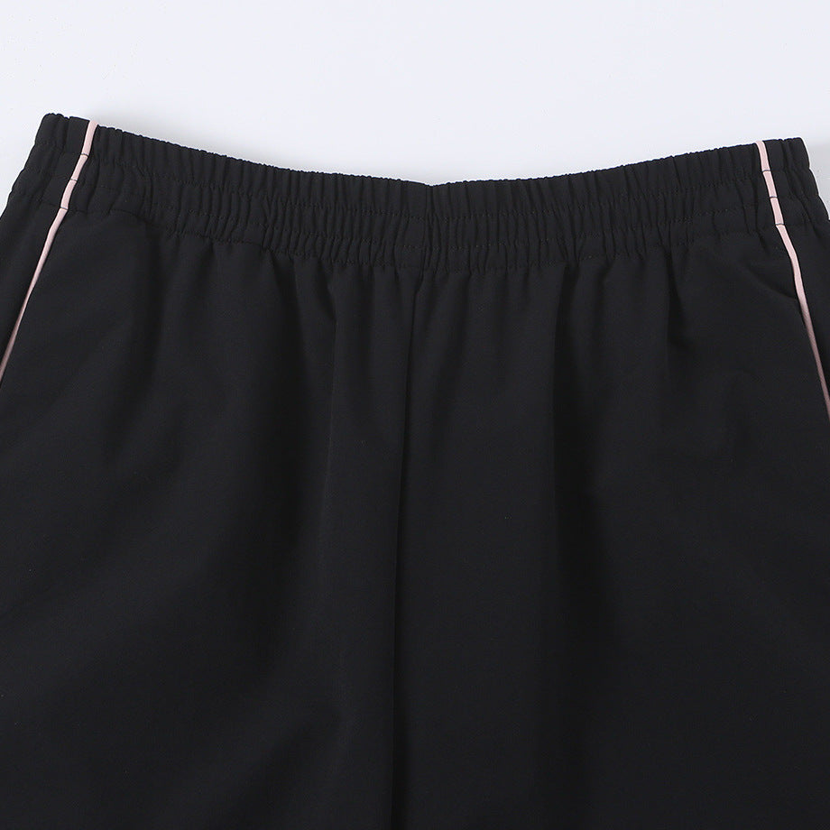 Women wide training pants with contrasting piping and elastic waistband Chichicherry