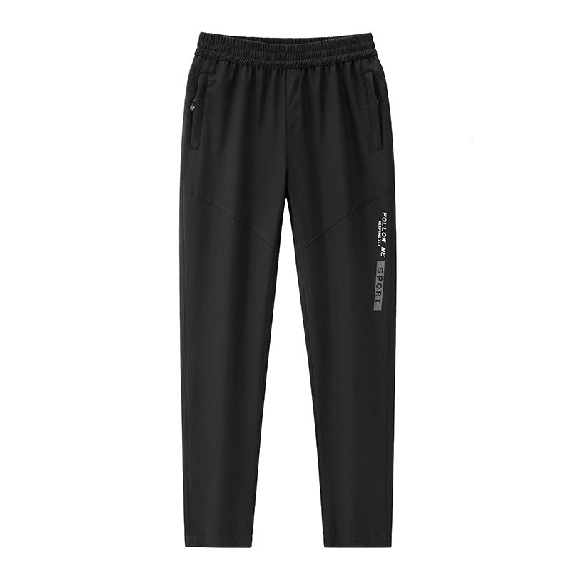 Men's Sportive Tapered Jogging Pants with Elastic Waistband, Zipper Pockets and Breathable Functional Material Chichicherry