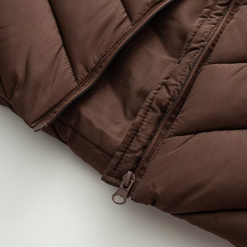 Women's hybrid quilted jacket with padding, hood, and elastic sleeve inserts Chichicherry