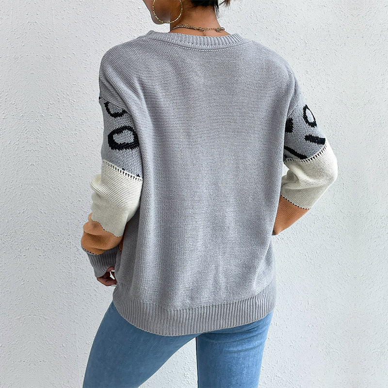 Women's oversized fine knit pullover with leopard jacquard, block stripes & open seam